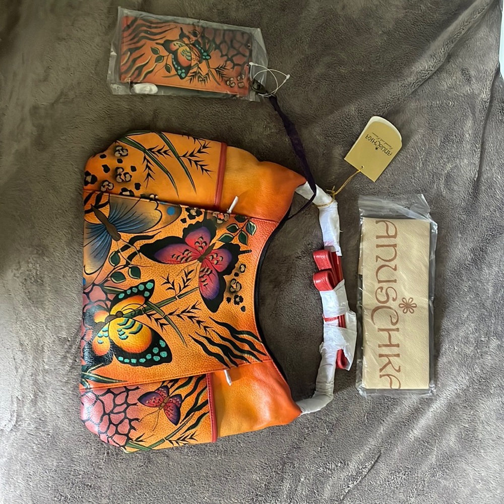 Anuschka leather orange hand painted bag with matching wallet